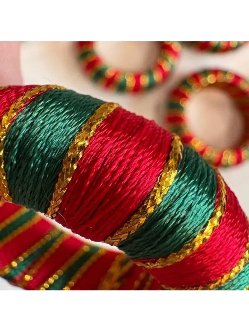Festive Red and Green Striped Napkin Rings with metallic gold thread. Set of 12.